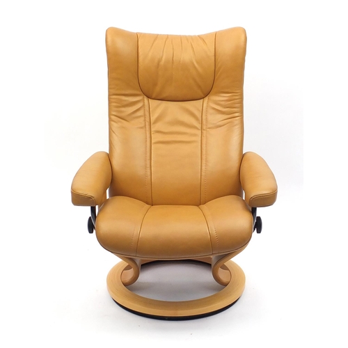 2004 - Ekornes tan leather stressless arm chair, 105cm high