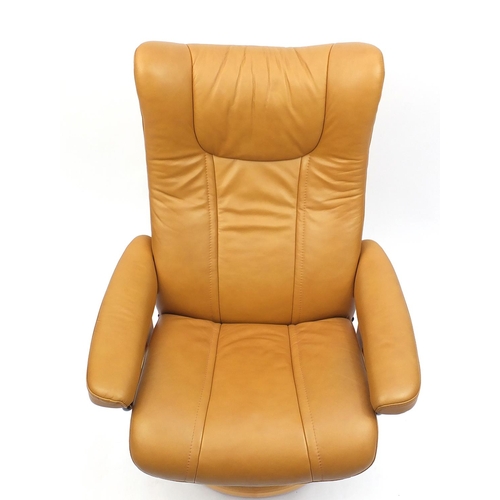 2004 - Ekornes tan leather stressless arm chair, 105cm high