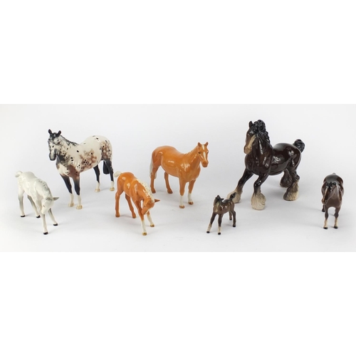 2368 - Seven Beswick horses and foals and an Appaloosa Royal Doulton example, the largest 24cm in length