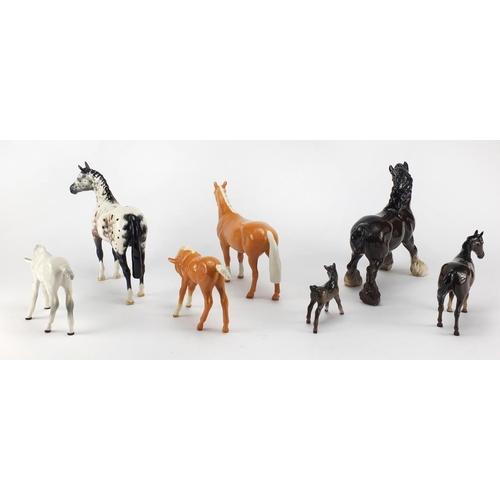 2368 - Seven Beswick horses and foals and an Appaloosa Royal Doulton example, the largest 24cm in length