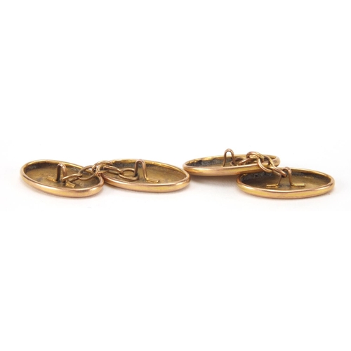 2636 - Pair of 9ct gold cuff links with floral chased decoration, approximate weight 2.9g