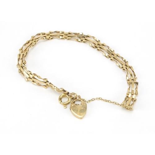 2542 - 9ct gold three row gate bracelet wit love heart padlock, 16cm in length, approximate weight 4.3g