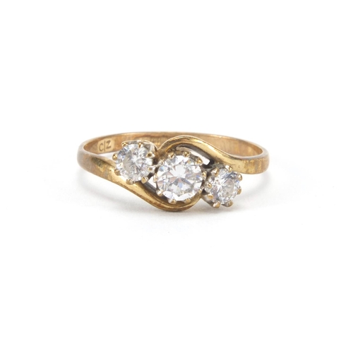 2572 - 9ct gold cubic zirconia crossover ring, size P, approximate weight 2.0g