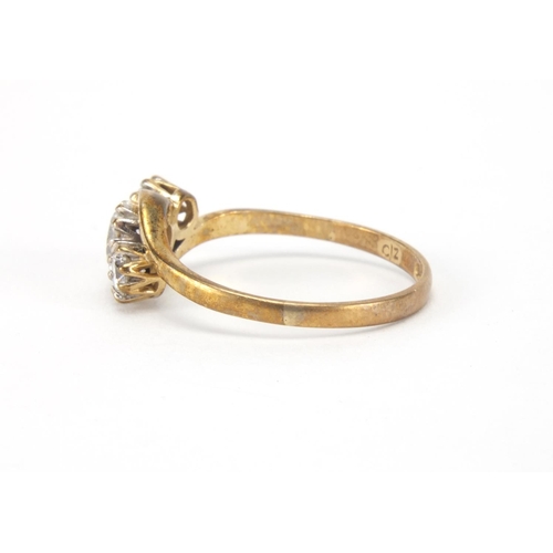 2572 - 9ct gold cubic zirconia crossover ring, size P, approximate weight 2.0g