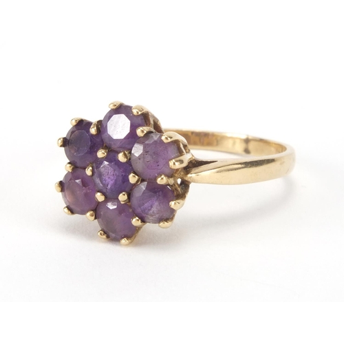 2637 - 9ct gold amethyst flower head ring, size O, approximate weight 3.0g