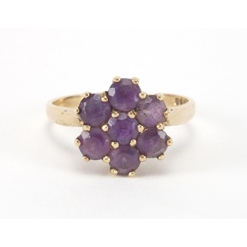 2637 - 9ct gold amethyst flower head ring, size O, approximate weight 3.0g