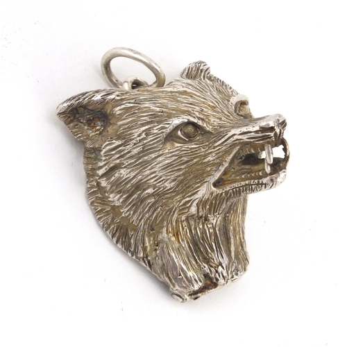 2414 - Novelty silver fox head pendant with hinged back, 2.6cm in length, approximate weight 26.0g