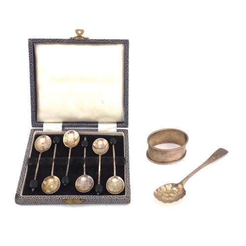 2428 - Silver items, Georgian berry spoon, oval napkin ring and a set of six coffee bean spoons, various ha... 