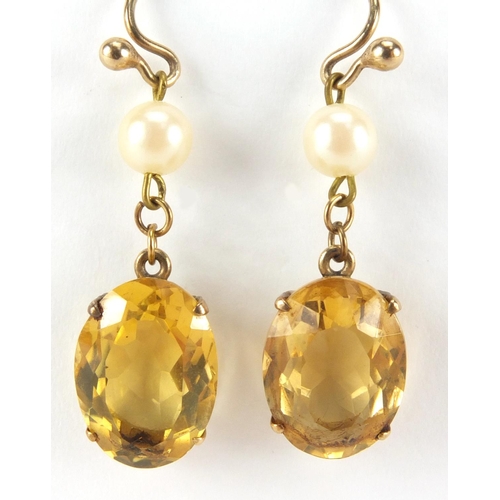 2560 - Pair of gold coloured metal citrine and simulated pearl earrings, 4cm in length, approximate weight ... 