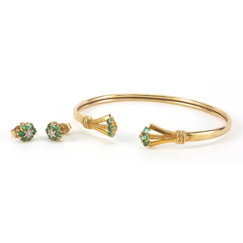 2519 - 9ct gold bracelet set with emeralds and a pair of 9ct gold emerald and diamond earrings, approximate... 