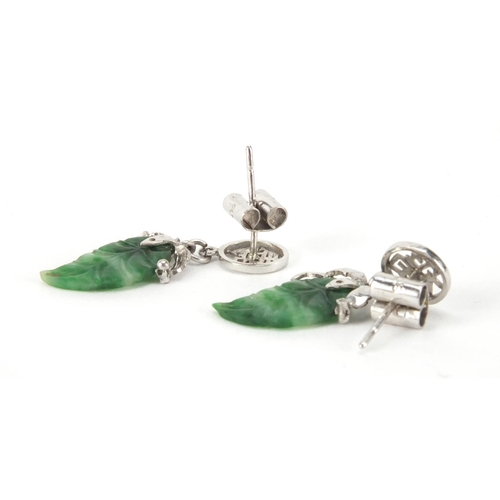 2600 - Pair of Oriental white metal and jade leaf earrings, the backs marked 14k, approximate weight 2.6g