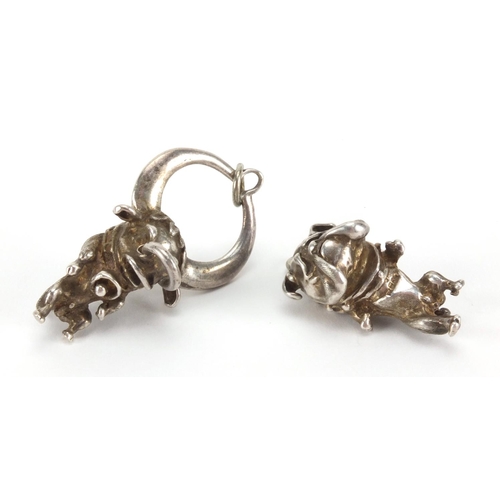 2419 - Novelty silver bulldog pendant and bull pendant, the largest 5cm in length, approximate weight  41.4... 