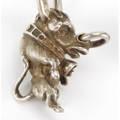 2419 - Novelty silver bulldog pendant and bull pendant, the largest 5cm in length, approximate weight  41.4... 