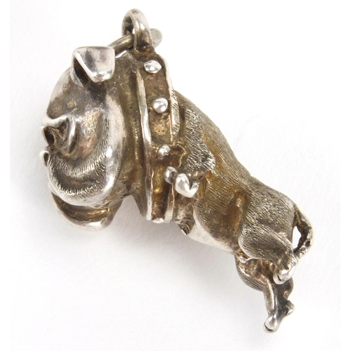 2419 - Novelty silver bulldog pendant and bull pendant, the largest 5cm in length, approximate weight  41.4... 