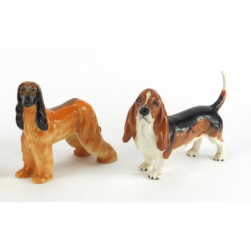 2369 - Five collectable dogs including two Beswick CH Cutmil Cupie and a Beswick Hajubah of Davlen, the lar... 