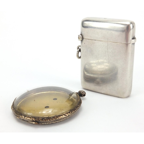 2411 - Rectangular silver vesta and a continental silver and gold pocket watch case with foliate decoration... 