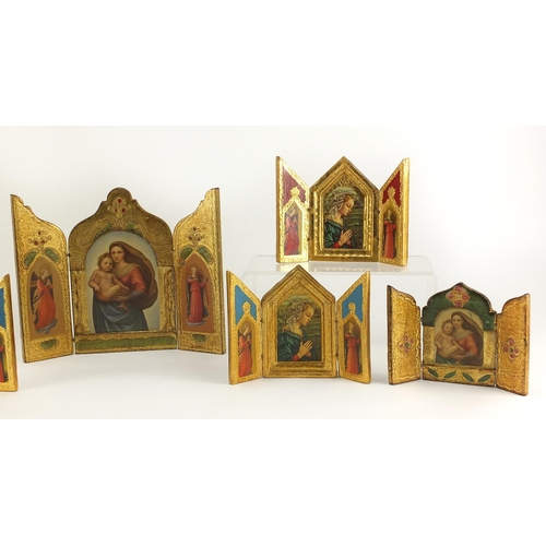 2399 - Seven religious gilt triptych icons, the largest 19cm high