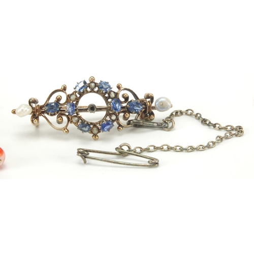 2663 - Unmarked gold sapphire and pearl brooch and a pair of 9ct gold coral earrings