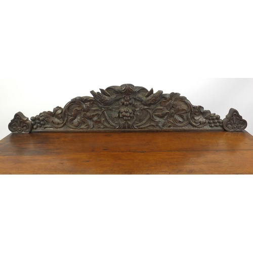 2039 - Victorian three tier oak buffet, carved with birds, vine leaves, grapes and face masks, 145cm H x 12... 
