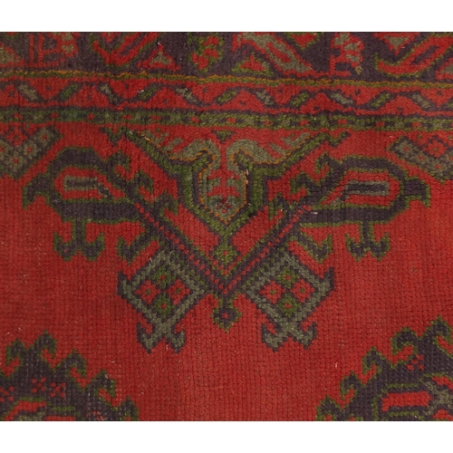 2065 - Rectangular Turkish Library Oushak rug, having all over geometric design onto a red ground, 230cm x ... 