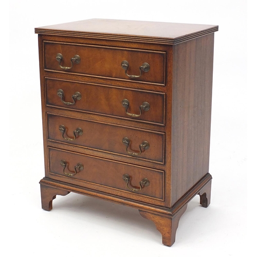 2051 - Mahogany four drawer chest of small proportions on bracket feet, 61m H x 47cm W x 33cm D
