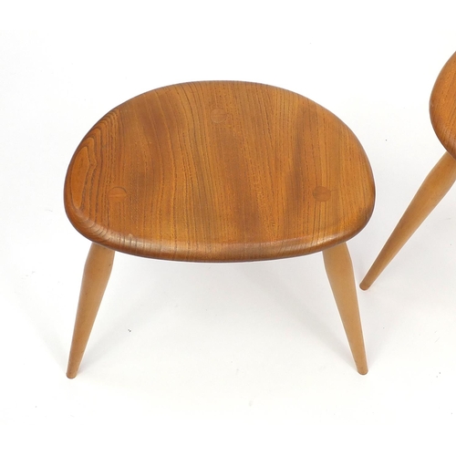 2029 - Ercol light elm nest of three pebble tables, the largest 40cm H x 65cm W x 44cm