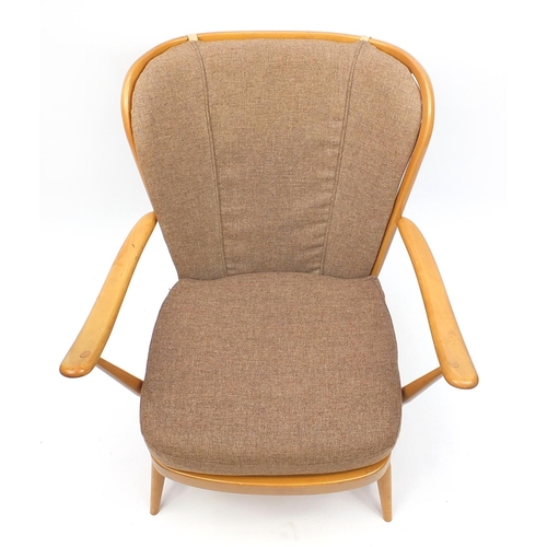 2049 - Ercol light elm stick back elbow chair with lift off upholstered cushions, 83cm high