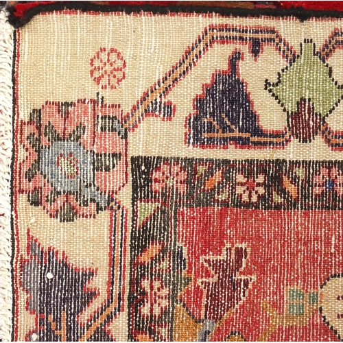 2060 - Rectangular Persian Hamadan rug, the central field and boarders with all over floral motifs onto a r... 