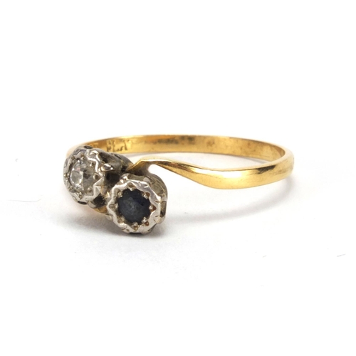 2556 - 18ct gold diamond and sapphire crossover ring, size U, approximate weight 2.9g