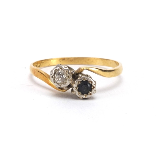 2556 - 18ct gold diamond and sapphire crossover ring, size U, approximate weight 2.9g