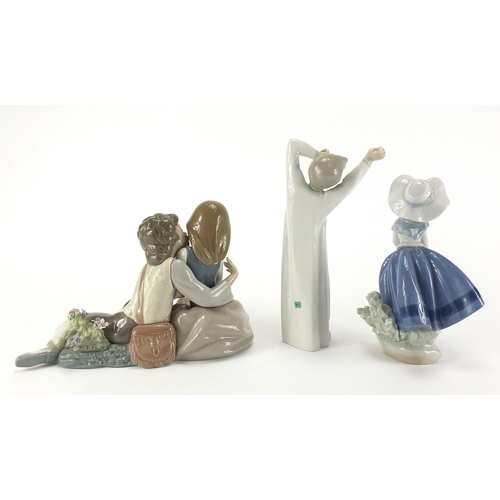 2364 - Three Lladro figures one of two lovers, numbered 5072, the largest 22cm high