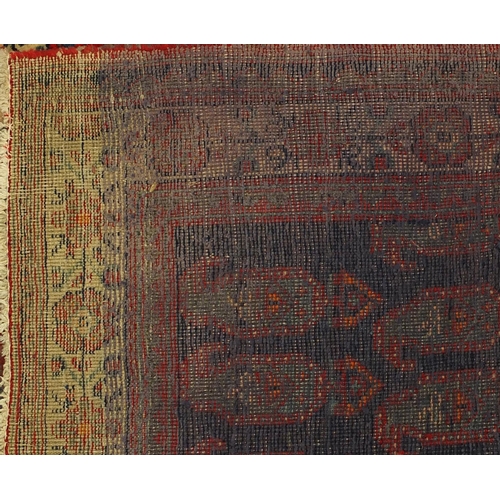 2055 - Rectangular Persian Hamadan carpet runner, having an all over stylised design within meandering flor... 