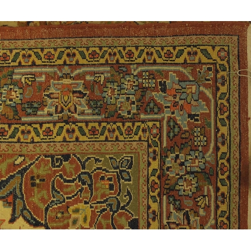 2040 - Rectangular Indian tree of life design rug onto a beige ground, 185cm x 125cm