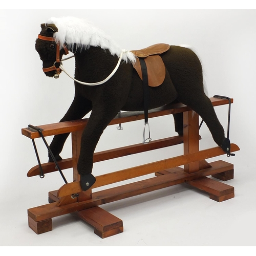 2038 - Childs Pegasus rocking horse on stand, 120cm in length