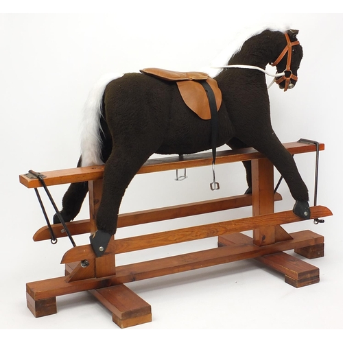 2038 - Childs Pegasus rocking horse on stand, 120cm in length