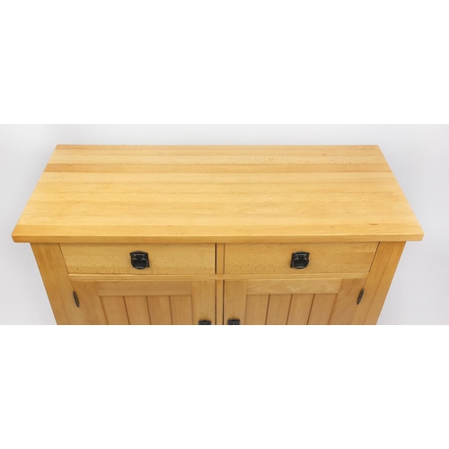 2034 - Light oak side cabinet fitted with two drawers above a pair of cupboard doors, 87cm H x 109cm W x 43... 