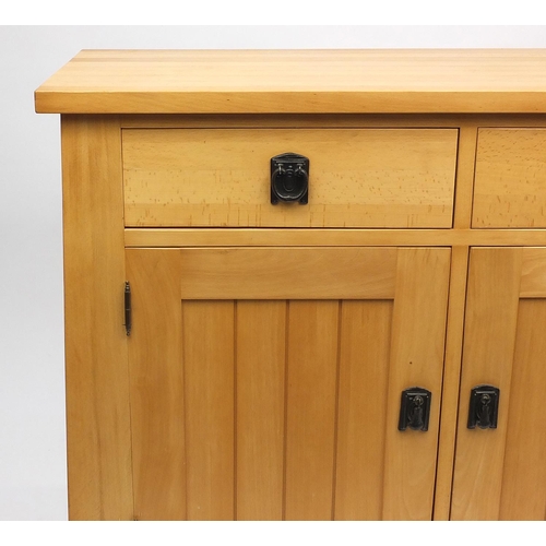 2034 - Light oak side cabinet fitted with two drawers above a pair of cupboard doors, 87cm H x 109cm W x 43... 