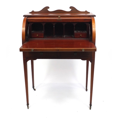 2019 - Victorian inlaid mahogany cylinder bureau, with fitted interior above two drawers above tapering leg... 