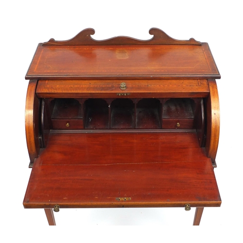 2019 - Victorian inlaid mahogany cylinder bureau, with fitted interior above two drawers above tapering leg... 