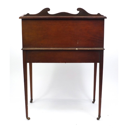 2019 - Victorian inlaid mahogany cylinder bureau, with fitted interior above two drawers above tapering leg... 