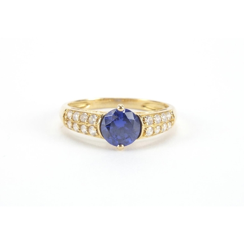 2615 - 18ct gold tanzanite and cubic zirconia ring, size P, approximate weight 3.0g