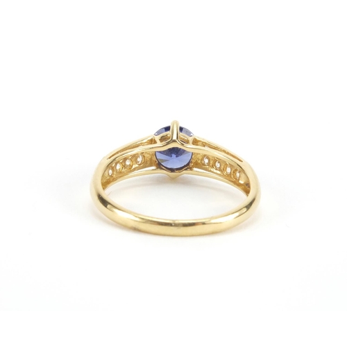 2615 - 18ct gold tanzanite and cubic zirconia ring, size P, approximate weight 3.0g