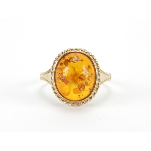 2579 - 9ct gold natural amber coloured ring, size N, approximate weight 2.3g