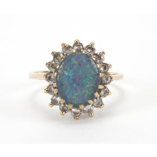 2575 - 9ct gold cubic zirconia and opalescent ring, size M, approximate weight 2.9g