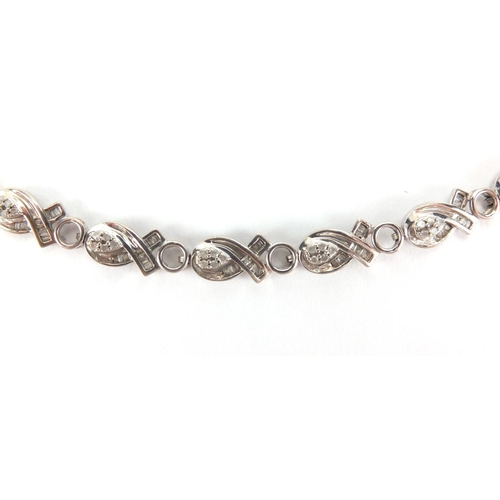 2608 - Stylish silver bracelet set with diamonds, 19cm in length, approximate weight 10.5g