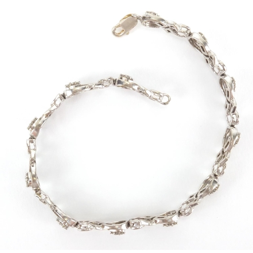 2608 - Stylish silver bracelet set with diamonds, 19cm in length, approximate weight 10.5g