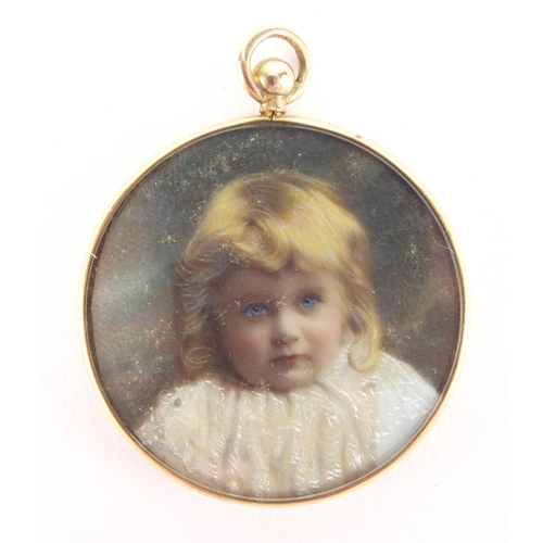 2632 - Circular 9ct gold mourning locket housing a portrait miniature of a young child, 3.2cm in diameter