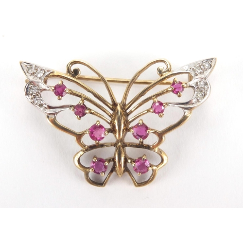 2534 - 9ct gold butterfly brooch set with rubies and diamonds, 3.5cm in length, approximate weight 4.4g