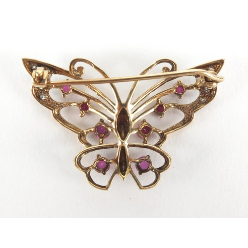 2534 - 9ct gold butterfly brooch set with rubies and diamonds, 3.5cm in length, approximate weight 4.4g