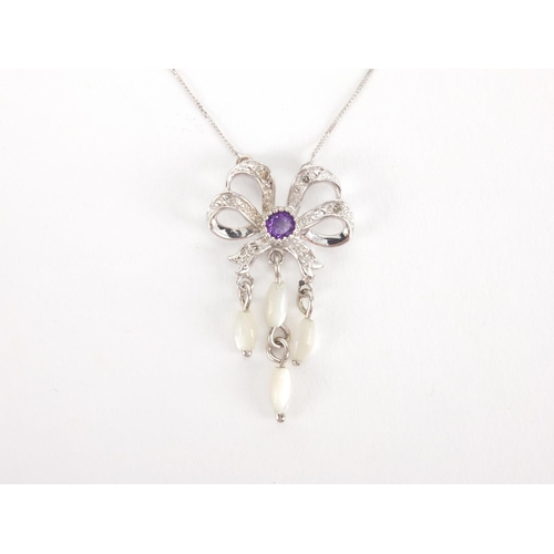 2531 - 9ct white gold pendant necklace set with amethyst, diamonds and Mother of pearl, 40cm in length, app... 